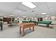 Community game room featuring a ping pong table, foosball, and billiards tables at 10035 63Rd N Ave # 12, St Petersburg, FL 33708