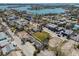 Aerial view showing a residential area, with a bay and the Gulf in the background at 103 146Th E Ave, Madeira Beach, FL 33708