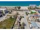 Coastal property featuring an expansive lot near the beach and the tranquil ocean waters at 103 146Th E Ave, Madeira Beach, FL 33708