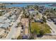 Picturesque aerial view shows a residential neighborhood with houses near the coast at 103 146Th E Ave, Madeira Beach, FL 33708