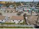 Neighborhood aerial view with charming cottage-style homes, sunny street at 103 146Th E Ave, Madeira Beach, FL 33708