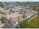 Neighborhood aerial view with charming cottage-style homes, sunny street at 103 146Th E Ave, Madeira Beach, FL 33708