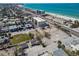 Aerial view overlooking a neighborhood near the beach, featuring cozy residences at 103 146Th E Ave, Madeira Beach, FL 33708
