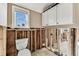 Bathroom needing renovation with a toilet and window ready to make it your own at 103 146Th E Ave, Madeira Beach, FL 33708