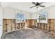 Bedroom with two windows offering lots of natural light, hardwood floors need refurbishment at 103 146Th E Ave, Madeira Beach, FL 33708