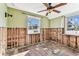 Bedroom ready for renovation, featuring natural light and ceiling fan at 103 146Th E Ave, Madeira Beach, FL 33708