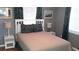Cozy bedroom with comfortable bed, side tables, and charming decor at 103 146Th E Ave, Madeira Beach, FL 33708