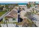 Charming, updated exterior featuring beach views, white picket fence, and plenty of parking at 103 146Th E Ave, Madeira Beach, FL 33708
