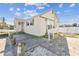 Exterior showcasing the home's architecture, dual entrances, and a parking space at 103 146Th E Ave, Madeira Beach, FL 33708