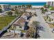 Charming updated cottage-style exterior featuring a fenced yard and nearby beaches at 103 146Th E Ave, Madeira Beach, FL 33708