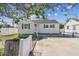 Charming single-story home with a cozy facade, well-lit windows, and a welcoming driveway at 103 146Th E Ave, Madeira Beach, FL 33708