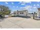 Front exterior with a parking spot and landscaping, enhancing the curb appeal at 103 146Th E Ave, Madeira Beach, FL 33708