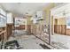 Kitchen with hardwood floors needing refurbishment offering lots of natural light, ample space for renovation at 103 146Th E Ave, Madeira Beach, FL 33708
