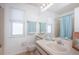 Cozy bathroom featuring a vanity with sink, a mirror and a shower-tub combination at 10906 Kenbrook Dr, Riverview, FL 33578