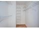 Walk-in closet with wire shelving, providing ample storage space for clothing and accessories at 10906 Kenbrook Dr, Riverview, FL 33578