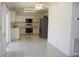 Eat-in kitchen boasting stainless steel appliances, a ceiling fan, and plenty of natural light at 10906 Kenbrook Dr, Riverview, FL 33578