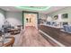 Inviting lobby area with modern finishes, comfortable seating, and a reception desk at 11147 Brambleleaf Way, Hudson, FL 34667