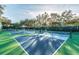 Outdoor tennis courts providing residents with recreational opportunities for an active lifestyle at 11147 Brambleleaf Way, Hudson, FL 34667