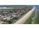 Gorgeous aerial view showcases beachfront property in tranquil location next to pristine beach at 1206 Gulf Blvd # C, Indian Rocks Beach, FL 33785