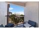 Balcony with black railings and furniture at 1206 Gulf Blvd # C, Indian Rocks Beach, FL 33785