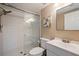 Modern bathroom with a glass-enclosed shower, white tile, and a clean, contemporary vanity at 1206 Gulf Blvd # C, Indian Rocks Beach, FL 33785