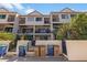 Beautiful multi-story townhome featuring private balconies, well-maintained landscaping, and convenient trash and recycling area at 1206 Gulf Blvd # C, Indian Rocks Beach, FL 33785
