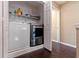 Convenient laundry room with modern washer and dryer units and adjacent storage, perfect for easy chore management at 1206 Gulf Blvd # C, Indian Rocks Beach, FL 33785