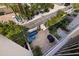 Inviting outdoor patio features comfortable seating, a grill, and lush greenery for relaxation and entertaining at 1206 Gulf Blvd # C, Indian Rocks Beach, FL 33785