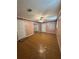 Bedroom with a ceiling fan and linoleum flooring at 125 S Wiggins Rd, Plant City, FL 33566