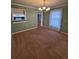 Dining room with view into kitchen and green walls at 125 S Wiggins Rd, Plant City, FL 33566