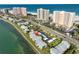 Aerial view of waterfront condo community with lush landscaping, close to the beach and local attractions at 1301 Gulf Blvd # 107, Clearwater Beach, FL 33767
