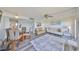 Comfortable living area featuring plush seating, dining area and easy access to other living spaces at 1301 Gulf Blvd # 107, Clearwater Beach, FL 33767