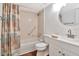 Bathroom featuring a vanity with a mirror, toilet, and bathtub with shower at 1400 Pine Glen Ln # B2, Tarpon Springs, FL 34688