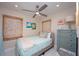 Bedroom features a coastal styled aesthetic with neutral colored decor at 1507 Legion Ln, Indian Rocks Beach, FL 33785
