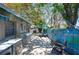 The outdoor kitchen and dining area provide a perfect spot for entertainment, complete with a painted privacy fence at 1507 Legion Ln, Indian Rocks Beach, FL 33785