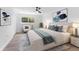 Bedroom featuring light hardwood floors, ceiling fan, neutral color palette and natural light at 1700 Azalea Ct # B, Oldsmar, FL 34677