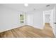 Bright bedroom with new flooring, closet, and natural light at 18238 Clear Lake Dr, Lutz, FL 33548