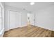 Bedroom featuring a double closet and new flooring at 18238 Clear Lake Dr, Lutz, FL 33548