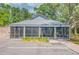 View of covered clubhouse and recreation area with convenient parking spaces at 18238 Clear Lake Dr, Lutz, FL 33548