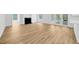 Spacious living room area with a fireplace and new floors leading to an outdoor pool at 18238 Clear Lake Dr, Lutz, FL 33548