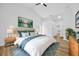 Spacious main bedroom featuring neutral decor, accent lighting, and modern wood-look flooring at 18238 Clear Lake Dr, Lutz, FL 33548