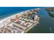 Stunning aerial view of beach condos with boat docks and beautiful ocean views at 19417 Gulf Blvd # E217, Indian Shores, FL 33785
