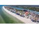 Aerial view of a coastal condo community with direct beach access, and scenic waterfront views at 19417 Gulf Blvd # E217, Indian Shores, FL 33785