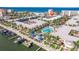 Aerial view of waterfront condo community with pool, marina and beach access perfect for a relaxing vacation at 19417 Gulf Blvd # E217, Indian Shores, FL 33785