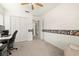 Spacious bedroom featuring neutral walls, carpet flooring, and ample closet space at 19505 Morden Blush Dr, Lutz, FL 33558
