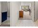 Hallway view leading to the living room, showcasing the home's layout at 19505 Morden Blush Dr, Lutz, FL 33558