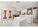Open kitchen with center island and breakfast bar seating at 19505 Morden Blush Dr, Lutz, FL 33558