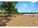 Swings provide a classic outdoor activity for residents to enjoy, set on a soft mulch surface at 19505 Morden Blush Dr, Lutz, FL 33558