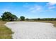 A sandy volleyball court offers residents a space for outdoor recreation and beach-like fun within the community at 19505 Morden Blush Dr, Lutz, FL 33558