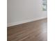 Bedroom featuring hardwood floors and natural light from the window at 207 Chippewa Ave, Tampa, FL 33606